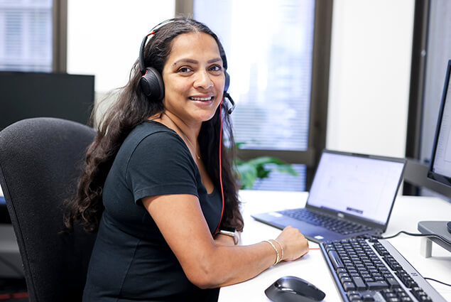 a circular overlay with two men walking down a street with text